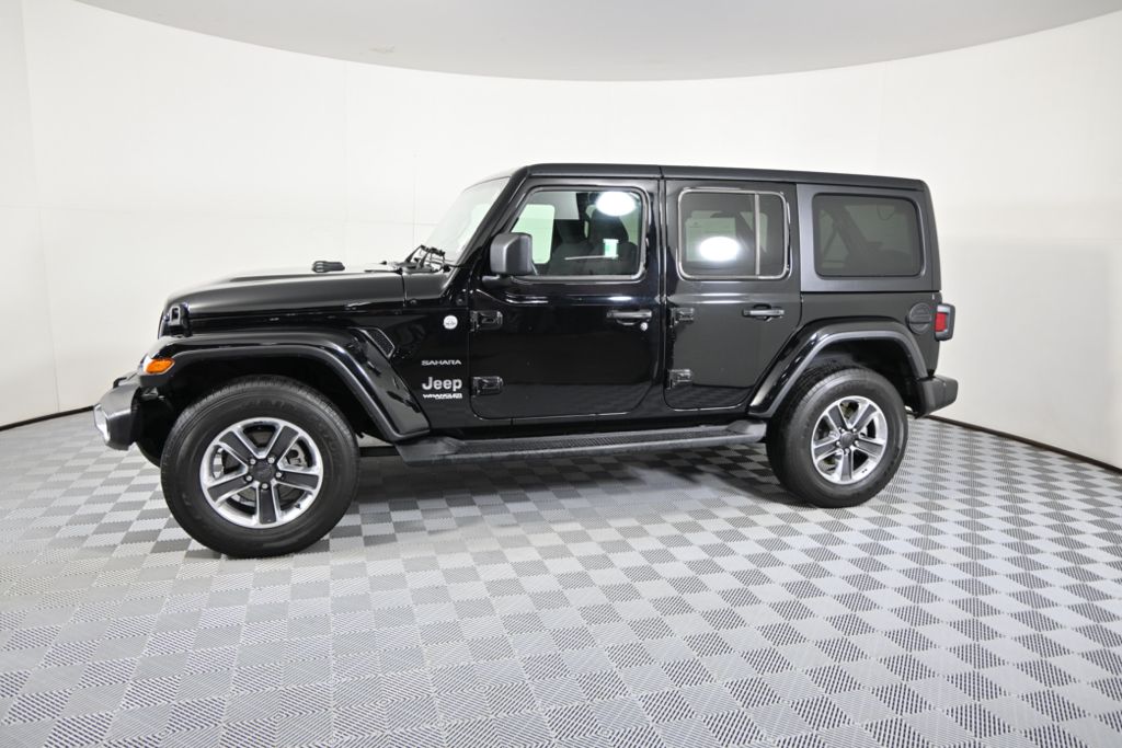 Used 2022 Jeep Wrangler Unlimited Sahara with VIN 1C4HJXEG9NW226816 for sale in Forest Lake, Minnesota