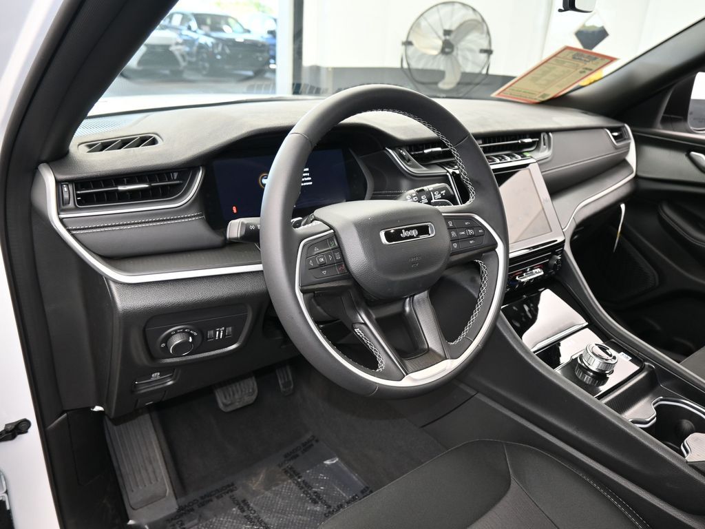 Used 2025 Bright White Clearcoat Jeep Laredo image 10