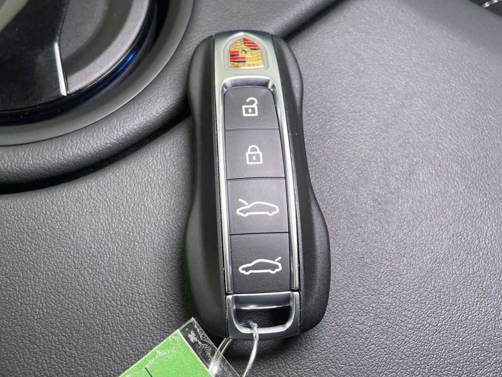2026 Porsche Taycan 4 White at Audi Porsche Sewickley