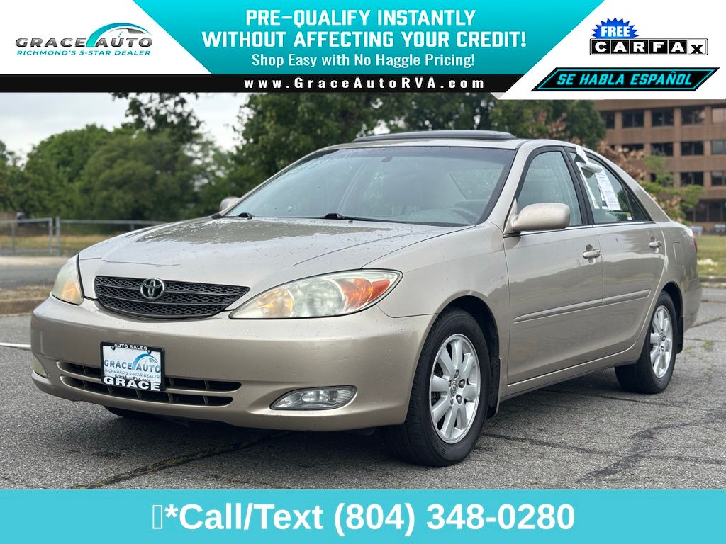 Desert Sand Mica 2003 Toyota Camry LE Sedan Front-Wheel Drive 5-Speed Manual Overdrive