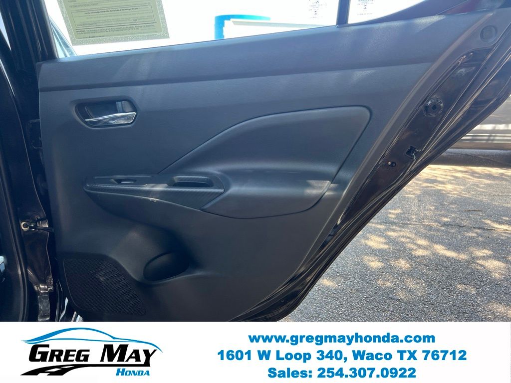 2024 Nissan Versa 1.6 SV Black at Greg May Honda