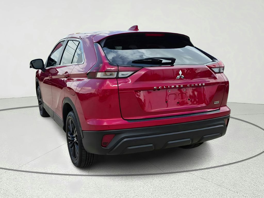 2025 Mitsubishi Eclipse Cross LE Red at DeMontrond Gulf Freeway