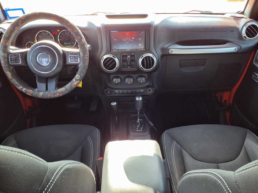 2015 Jeep Wrangler Unlimited Sahara Orange at Emmons Autoplex