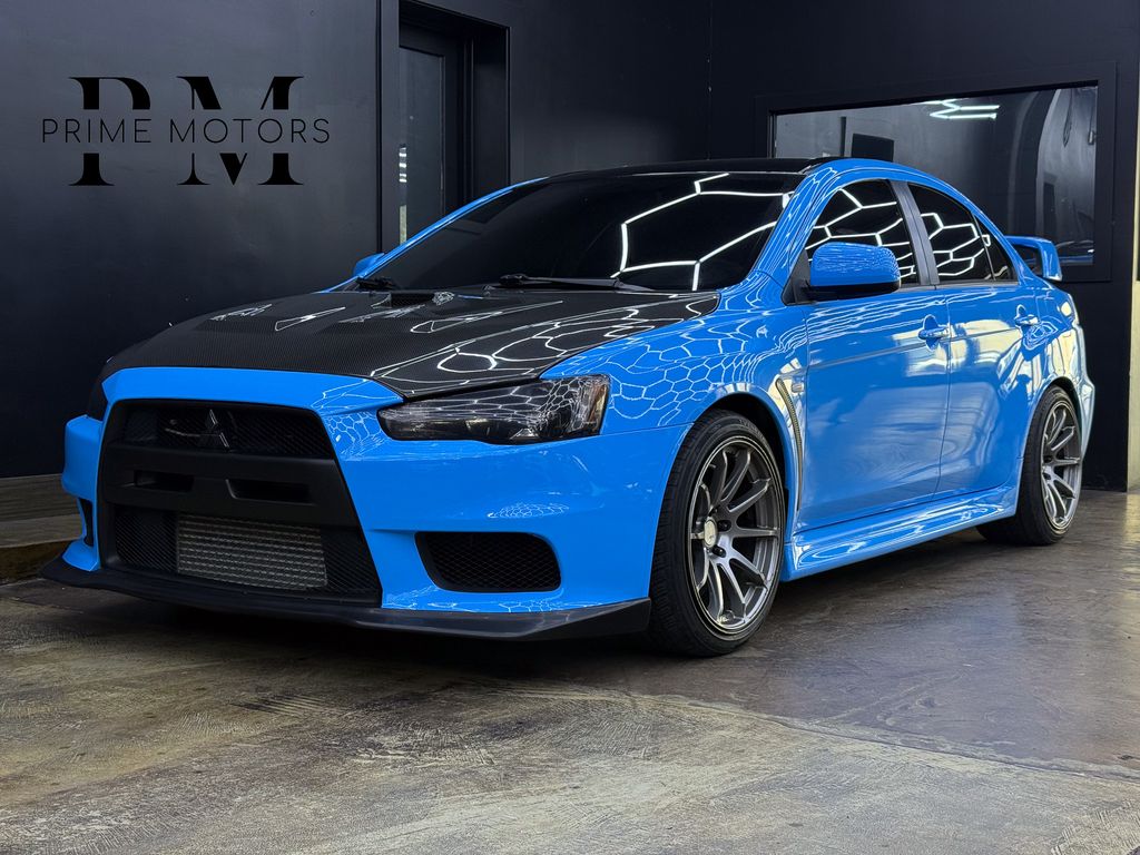 Blue / Black 2013 Mitsubishi Lancer Evolution GSR Sedan All-Wheel Drive 5-Speed Manual