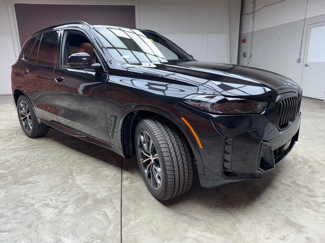 New 2026 Black BMW xDrive40i image 7