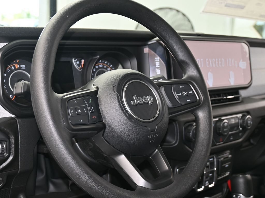 New 2026 bright white clearcoat Jeep Sport image 13