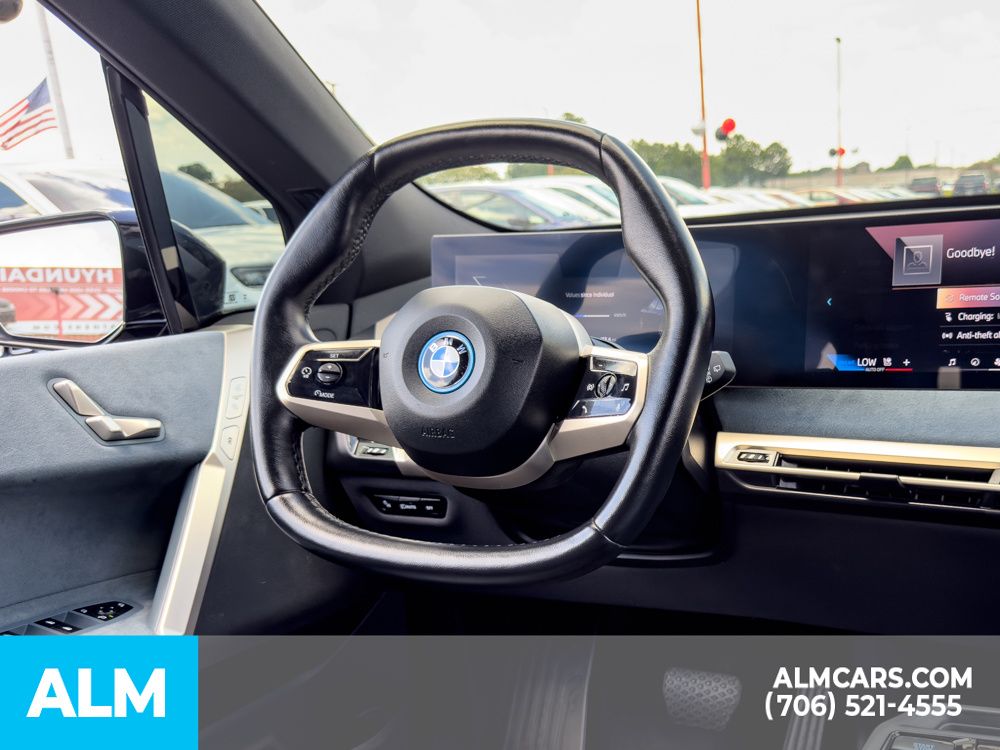 Used 2024 Black BMW xDrive50 image 30