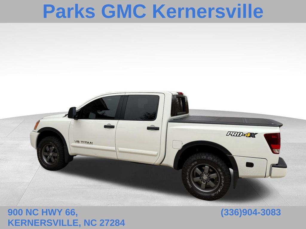 Glacier White 2015 Nissan Titan Pickup Truck Four-Wheel Drive 5-Speed Automatic