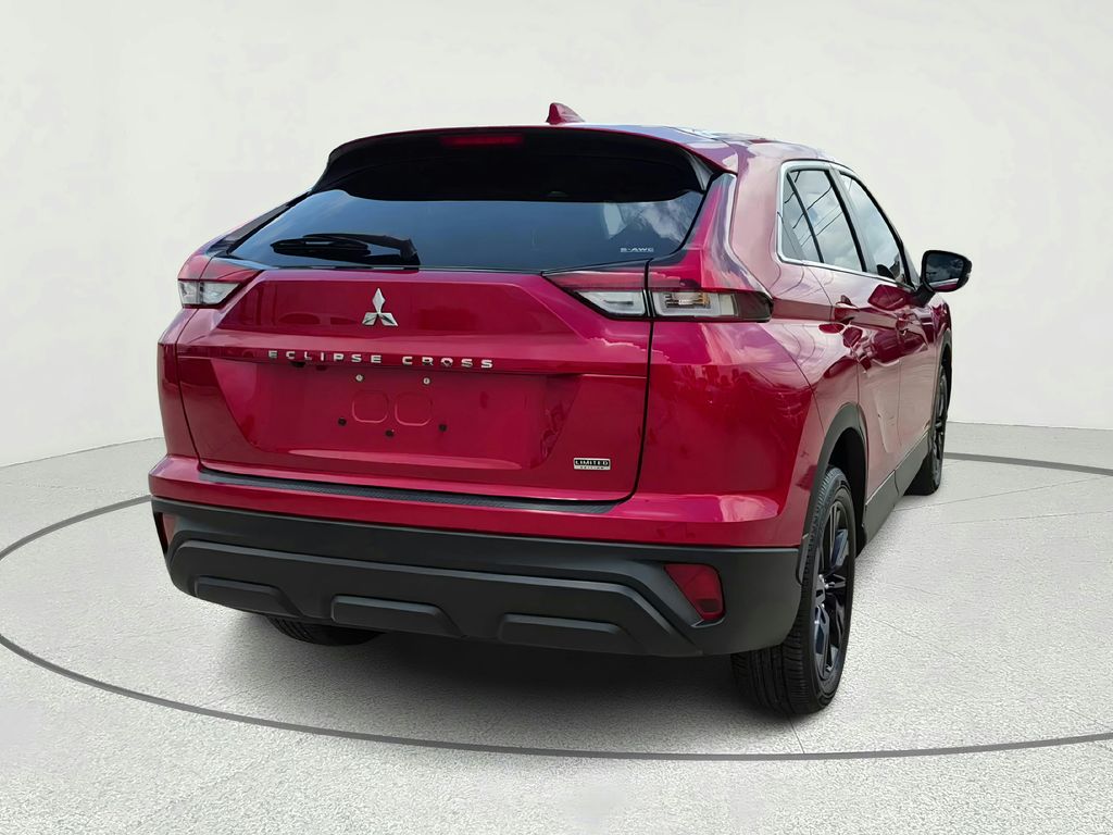 2025 Mitsubishi Eclipse Cross LE Red at DeMontrond Gulf Freeway