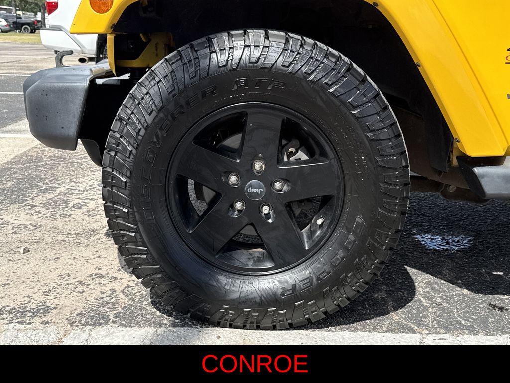2015 Jeep Wrangler Unlimited Sahara Yellow at Bayshore Chrysler Jeep Dodge Ram