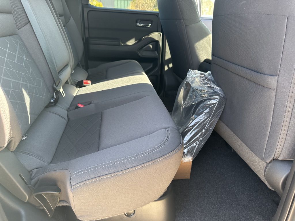 2025 Glacier White Nissan Frontier SV 4X4 Truck