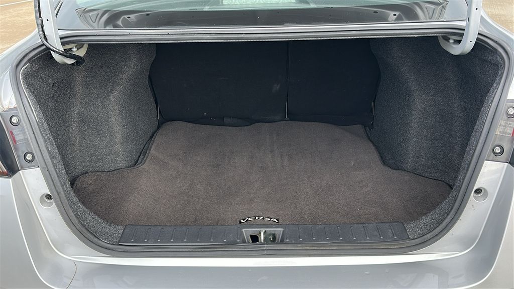 2025 Nissan Versa 1.6 SV Silver at South Houston Nissan