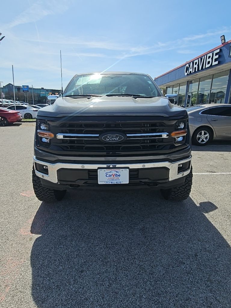 View vehicle photo 3