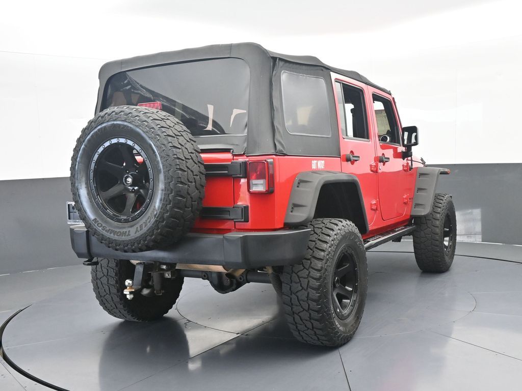Used 2014 Firecracker Red Clear Coat Jeep Unlimited Rubicon image 5