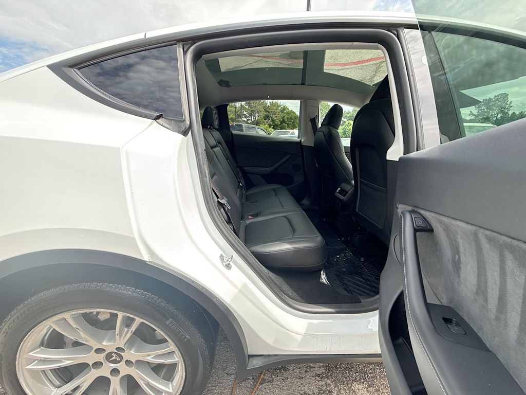2024 Tesla Model Y Long Range White at AutoSavvy Houston Southwest