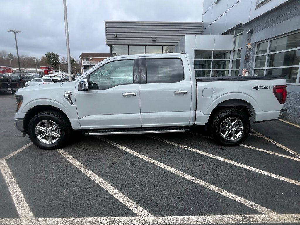 View vehicle photo 3