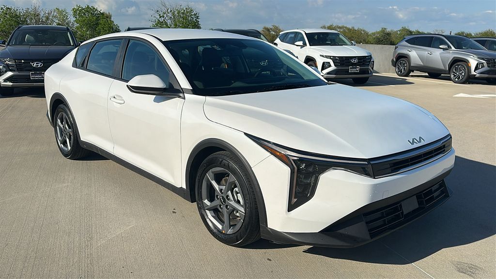 2025 Kia K4 LXS White at Shottenkirk Kia Fort Bend
