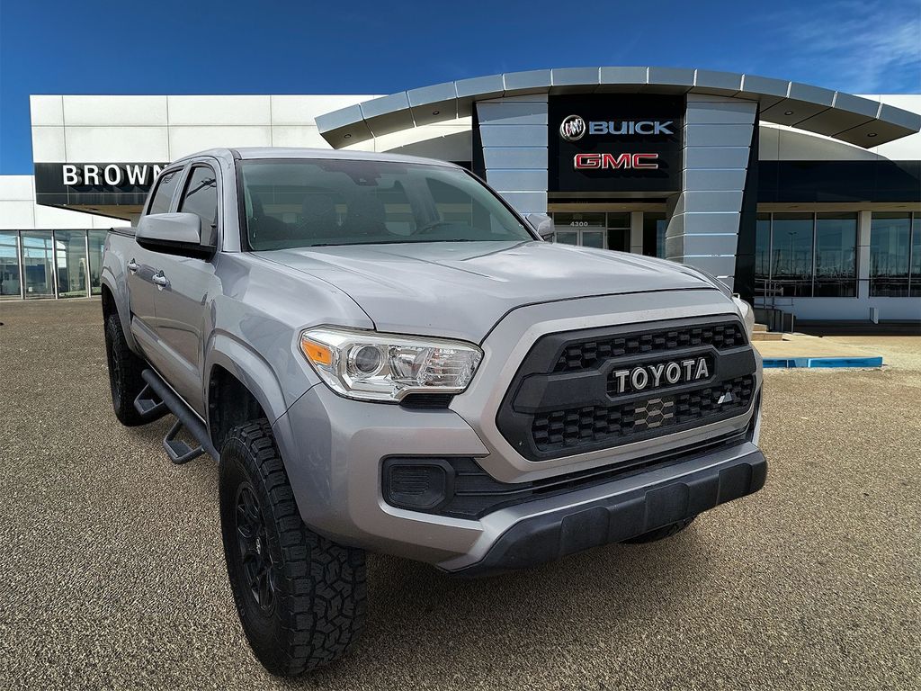 Silver Sky Metallic 2018 Toyota Tacoma SR I4 Double Cab RWD Pickup Truck 4X2 6-Speed Automatic