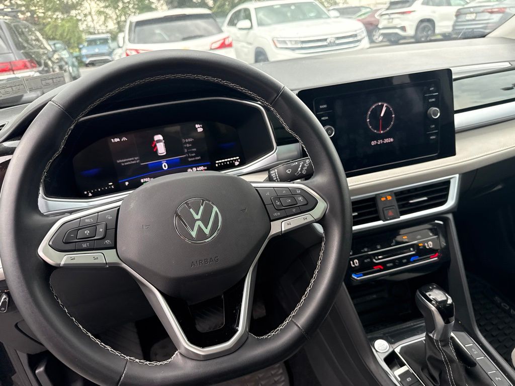 2025 Volkswagen Taos 1.5T SE Black at Sutliff Volkswagen