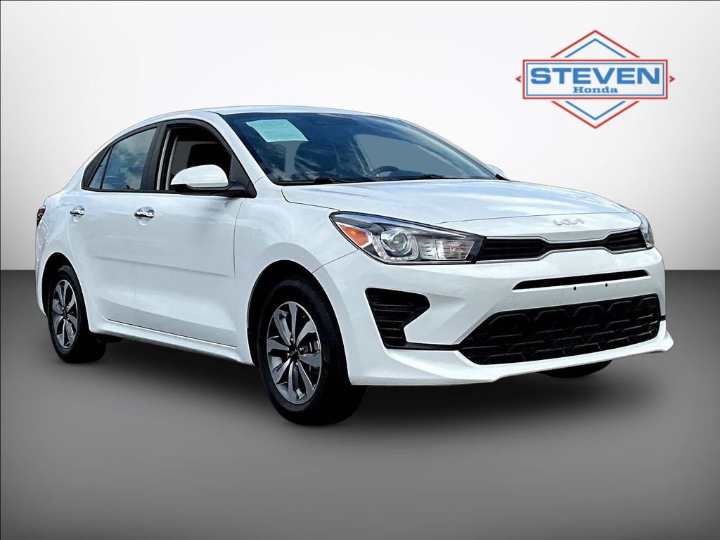 Clear White 2023 Kia Rio Sedan Front-Wheel Drive Continuously Variable Transmission