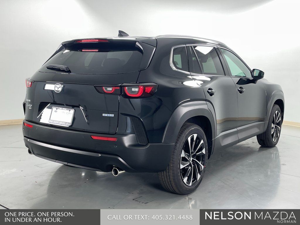 New 2026 Black Mazda Premium Plus image 6