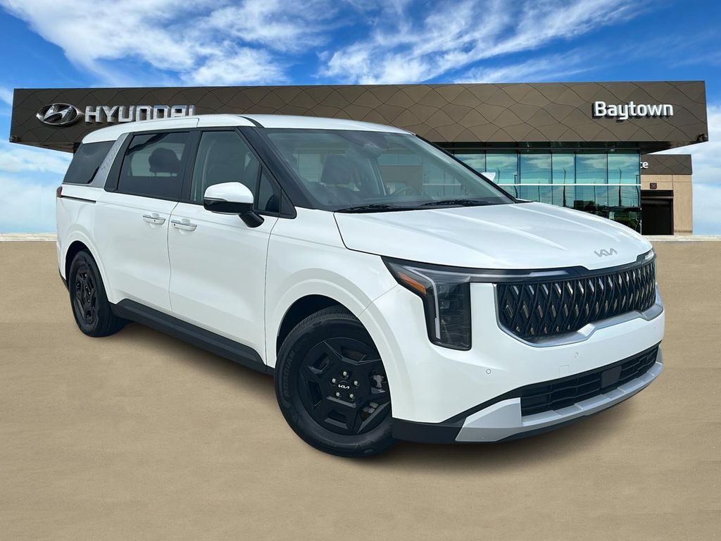 2026 Kia Carnival LXS White at DeMontrond Automotive Group