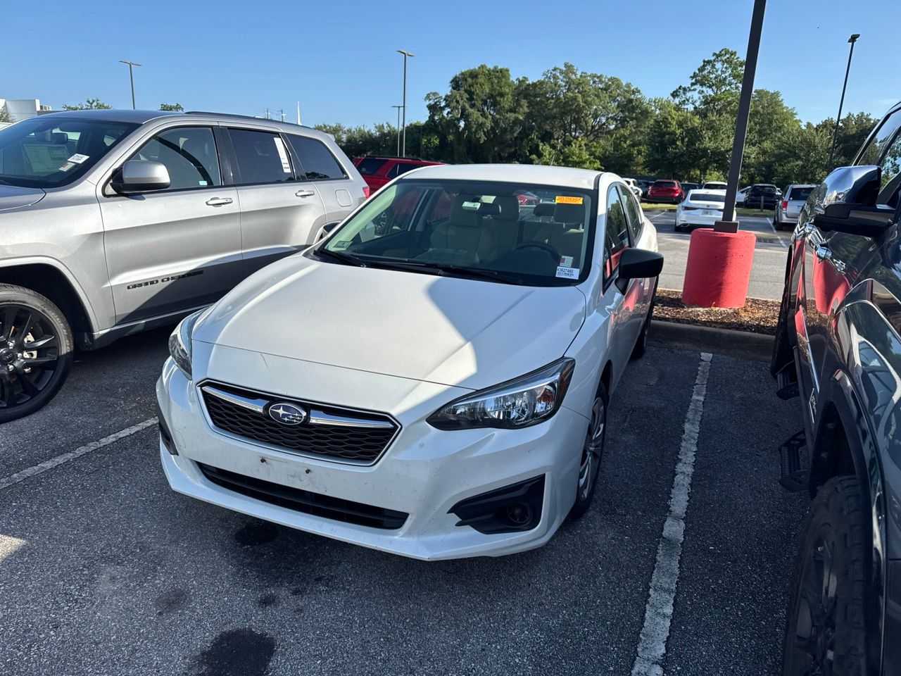 Crystal White Pearl 2019 Subaru Impreza Sedan All-Wheel Drive Continuously Variable Transmission