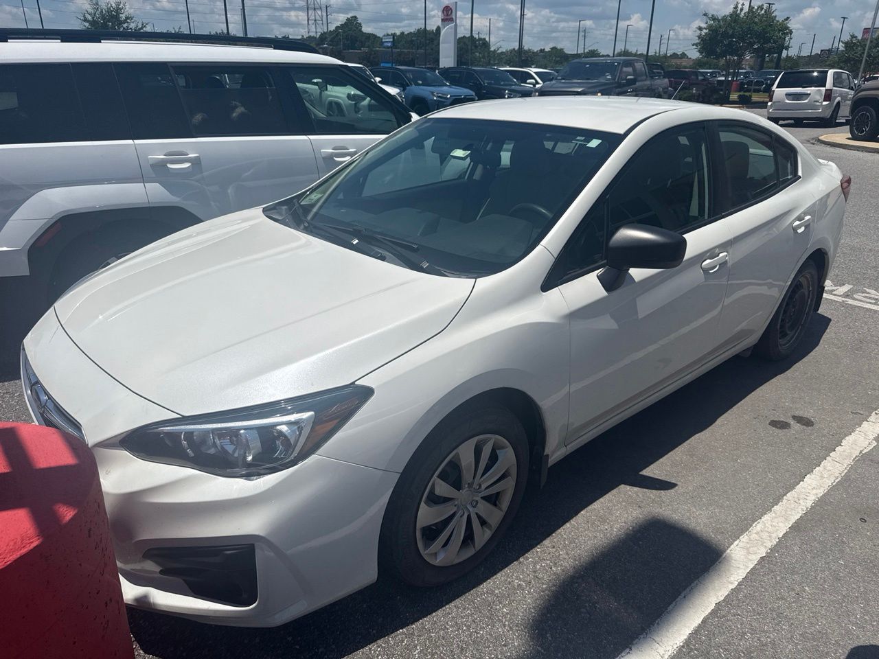Crystal White Pearl 2019 Subaru Impreza Sedan All-Wheel Drive Continuously Variable Transmission