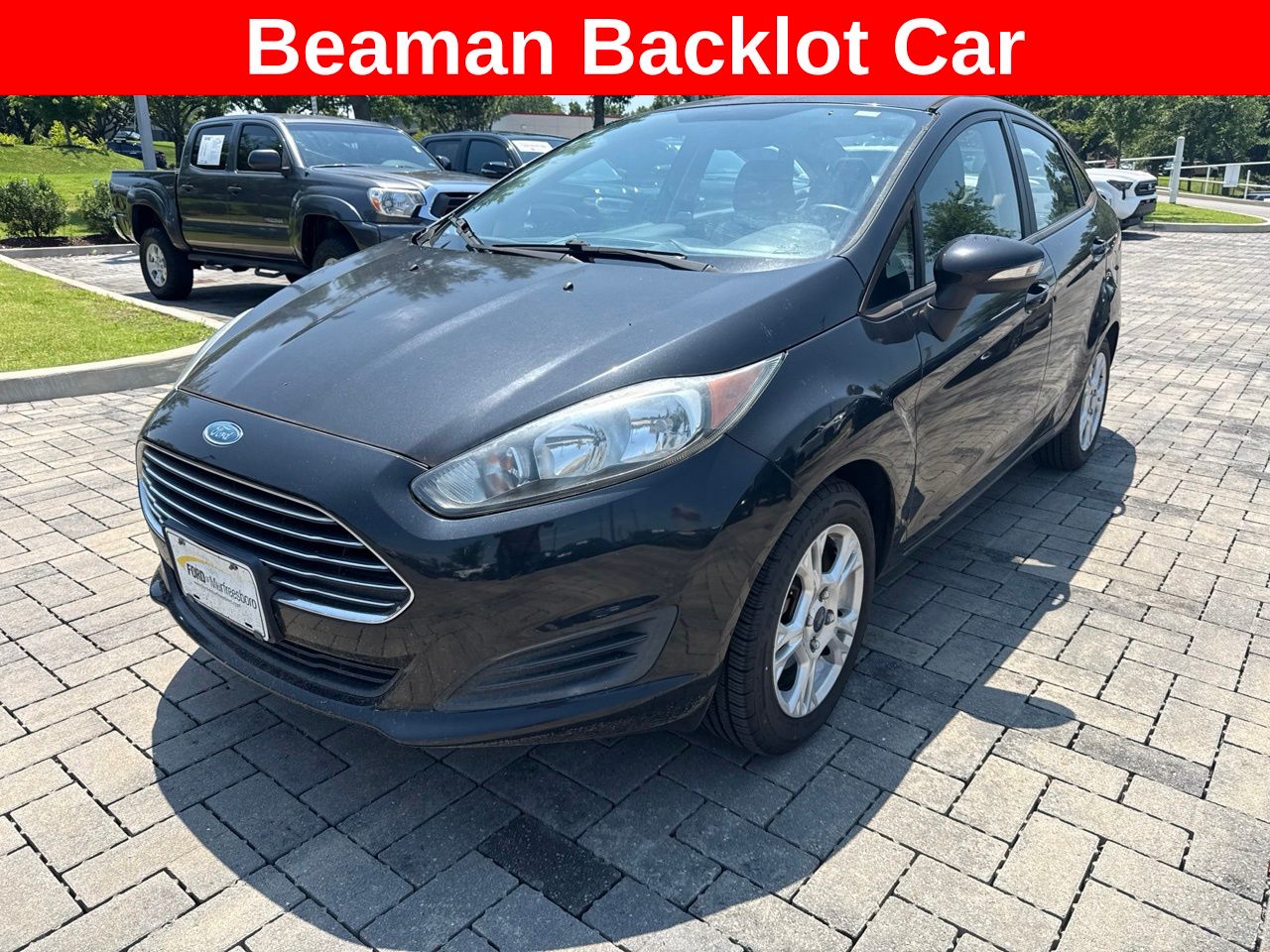 Tuxedo Black Metallic 2014 Ford Fiesta Sedan Front-Wheel Drive 6-Speed Automatic