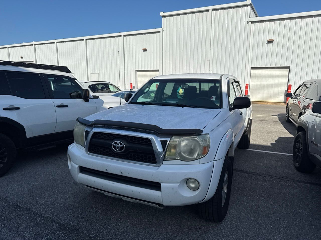 Super White 2011 Toyota Tacoma Pickup Truck Four-Wheel Drive 5-Speed Automatic Overdrive