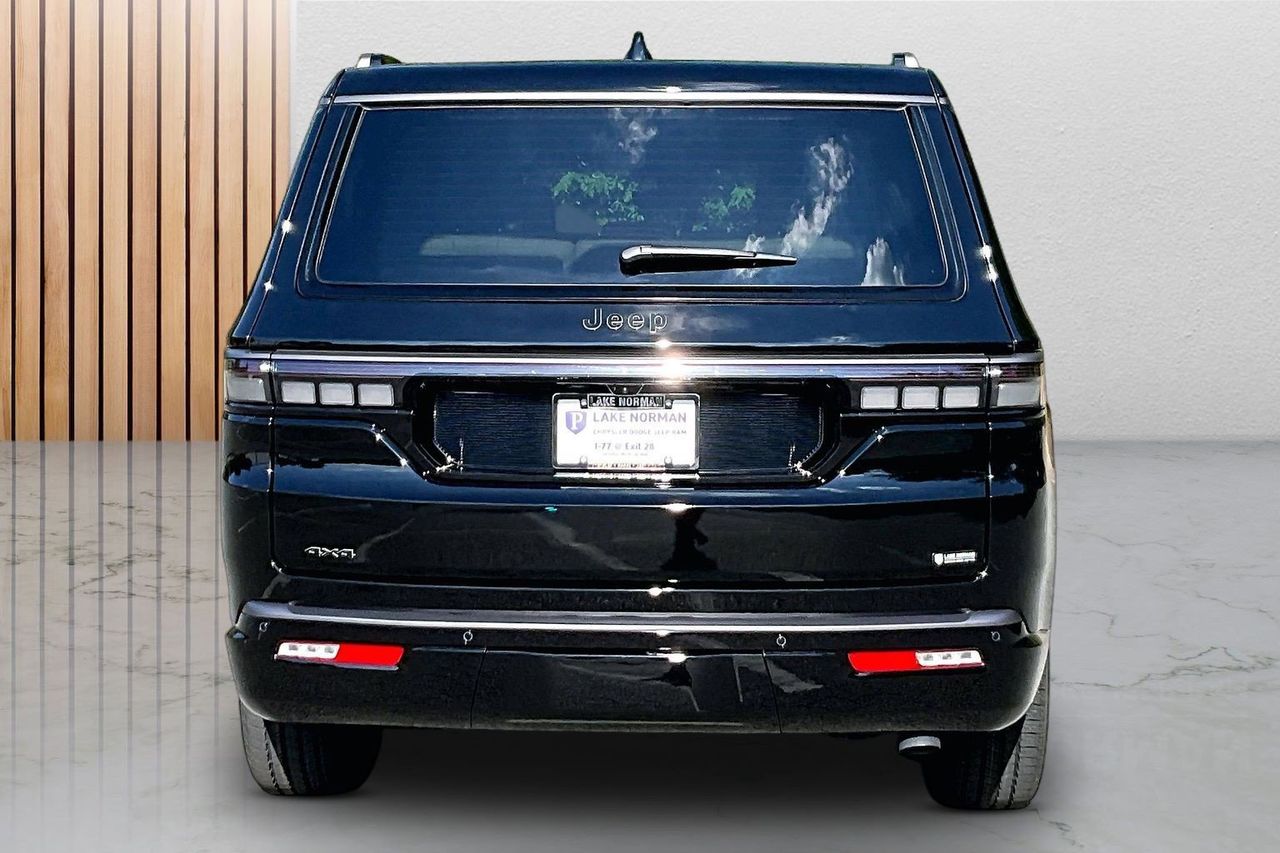 New 2026 Black Jeep Limited Altitude image 8