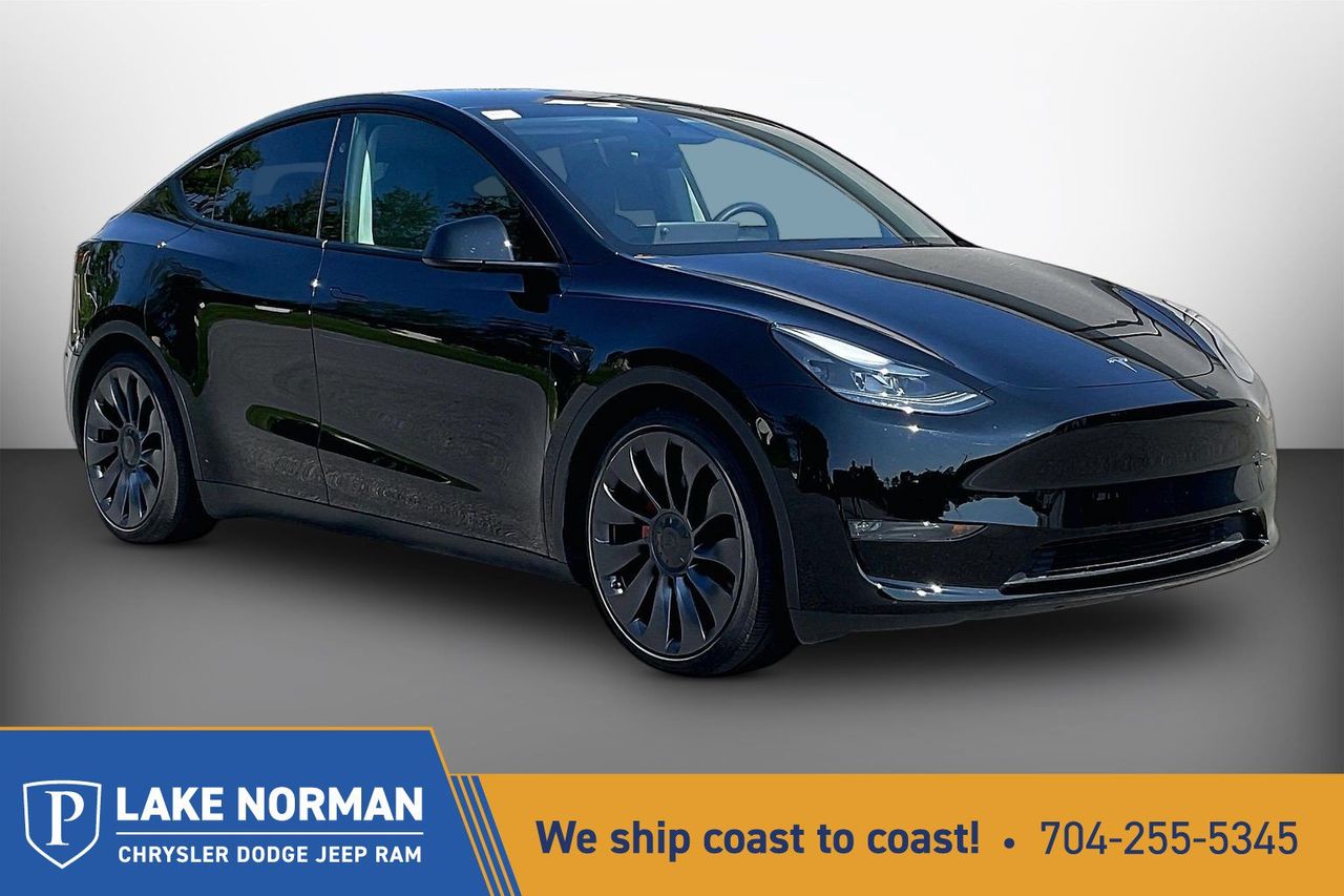 Solid Black 2025 Tesla Model Y SUV / Crossover All-Wheel Drive 1-Speed Automatic