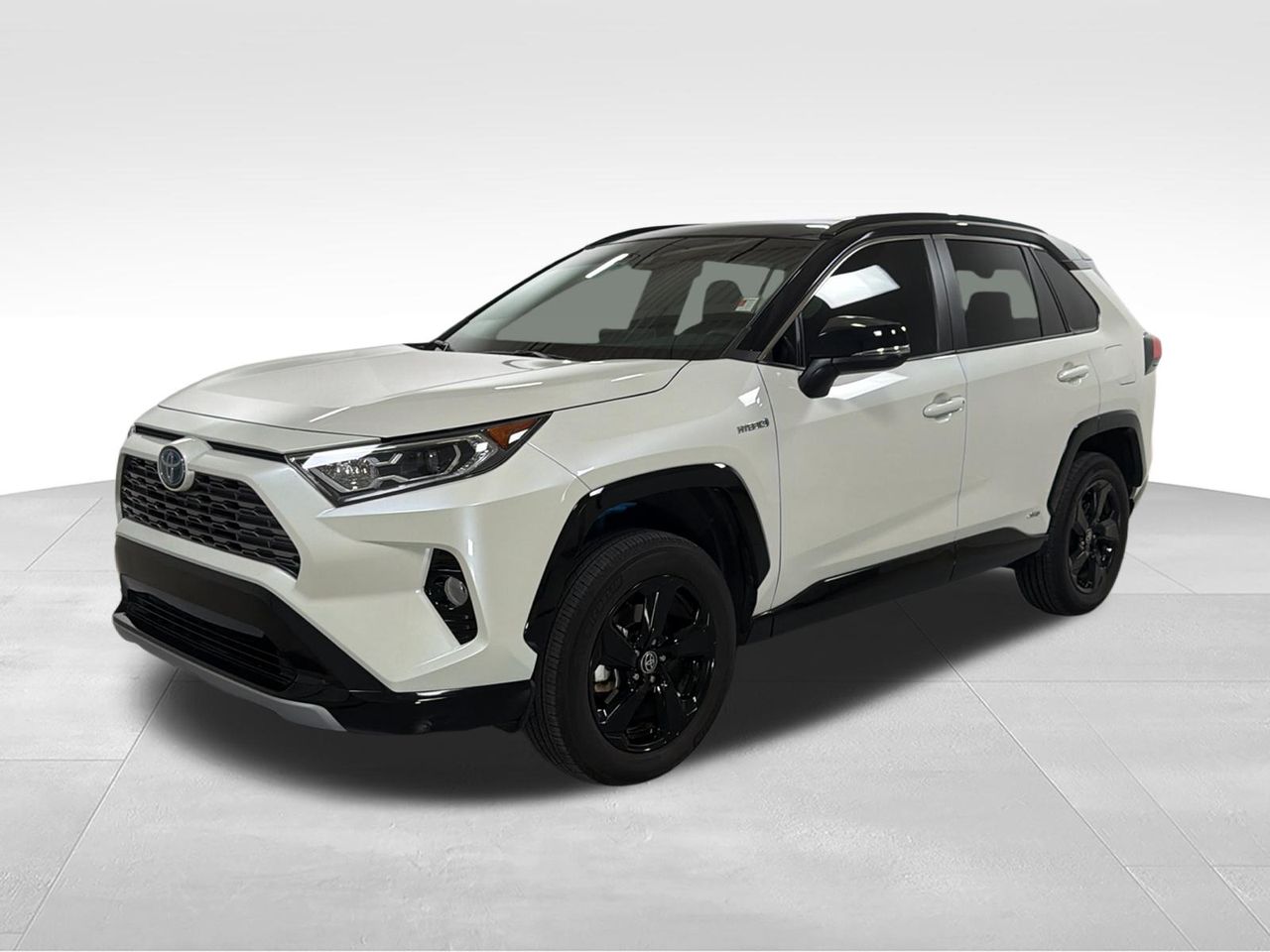 Blizzard Pearl/Midnight Black Metallic 2021 Toyota RAV4 Hybrid XSE AWD SUV / Crossover All-Wheel Drive Continuously Variable Transmission