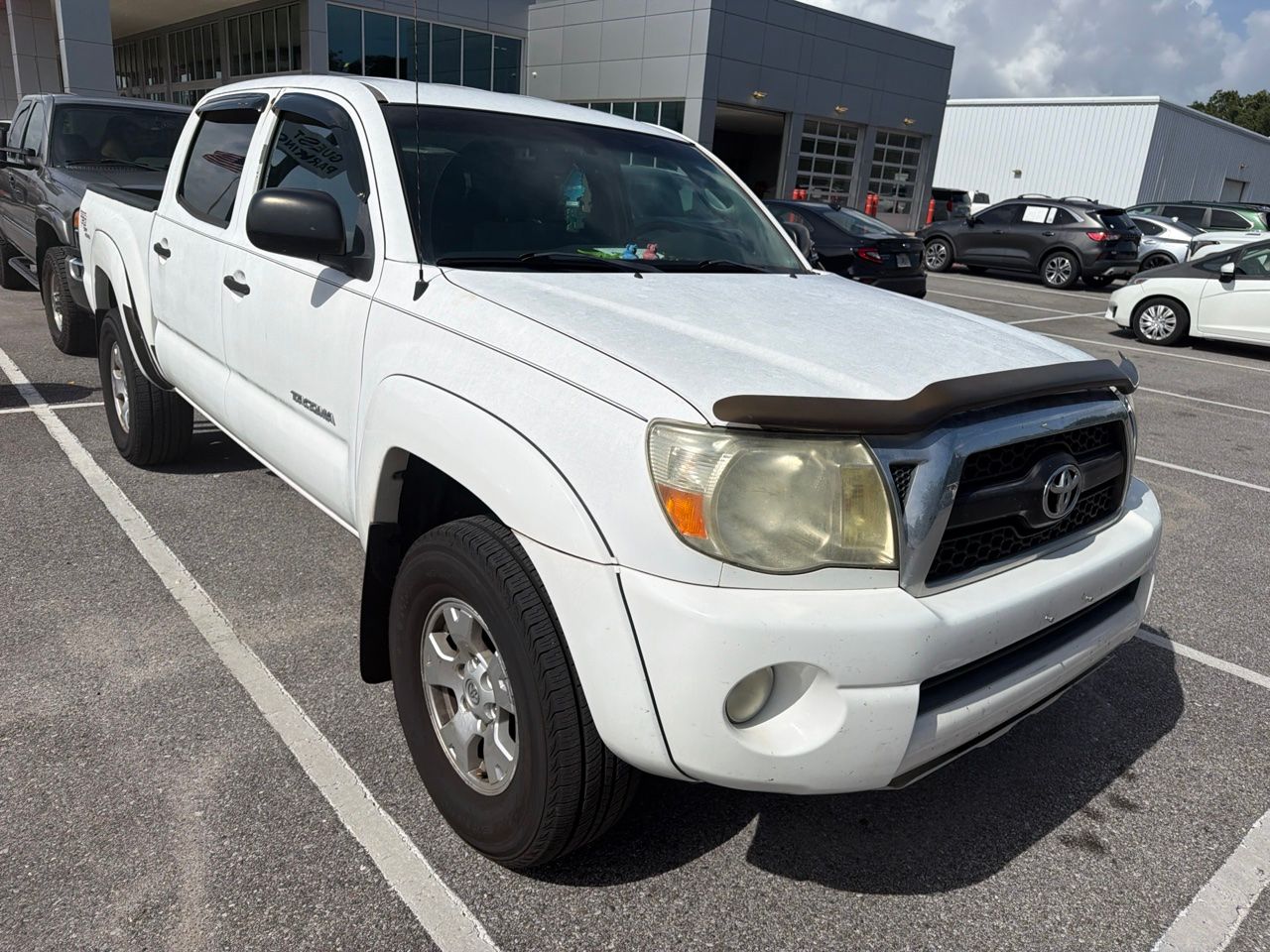 Super White 2011 Toyota Tacoma Pickup Truck Four-Wheel Drive 5-Speed Automatic Overdrive