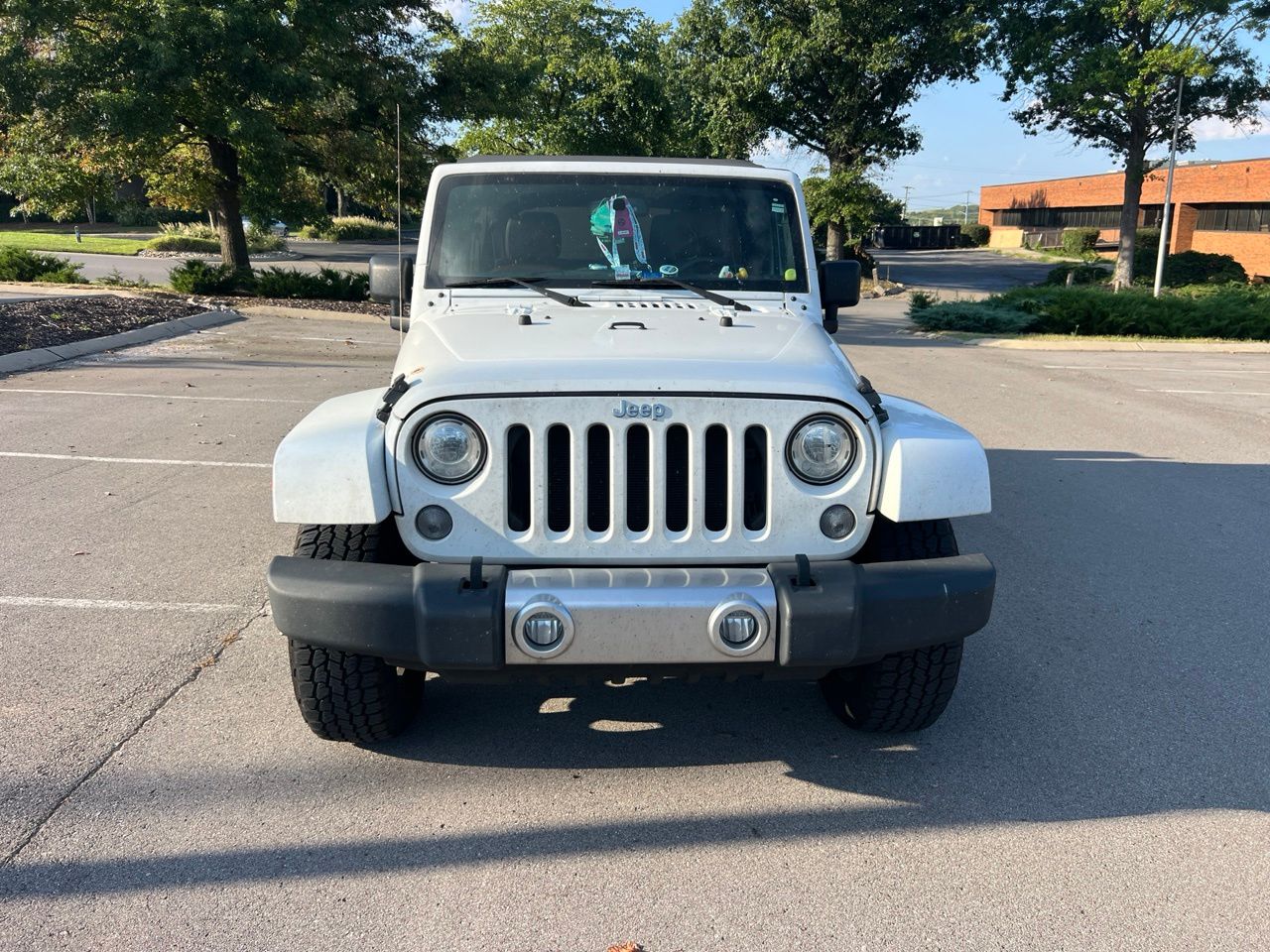 Used 2017 White Jeep Unlimited Sahara image 2