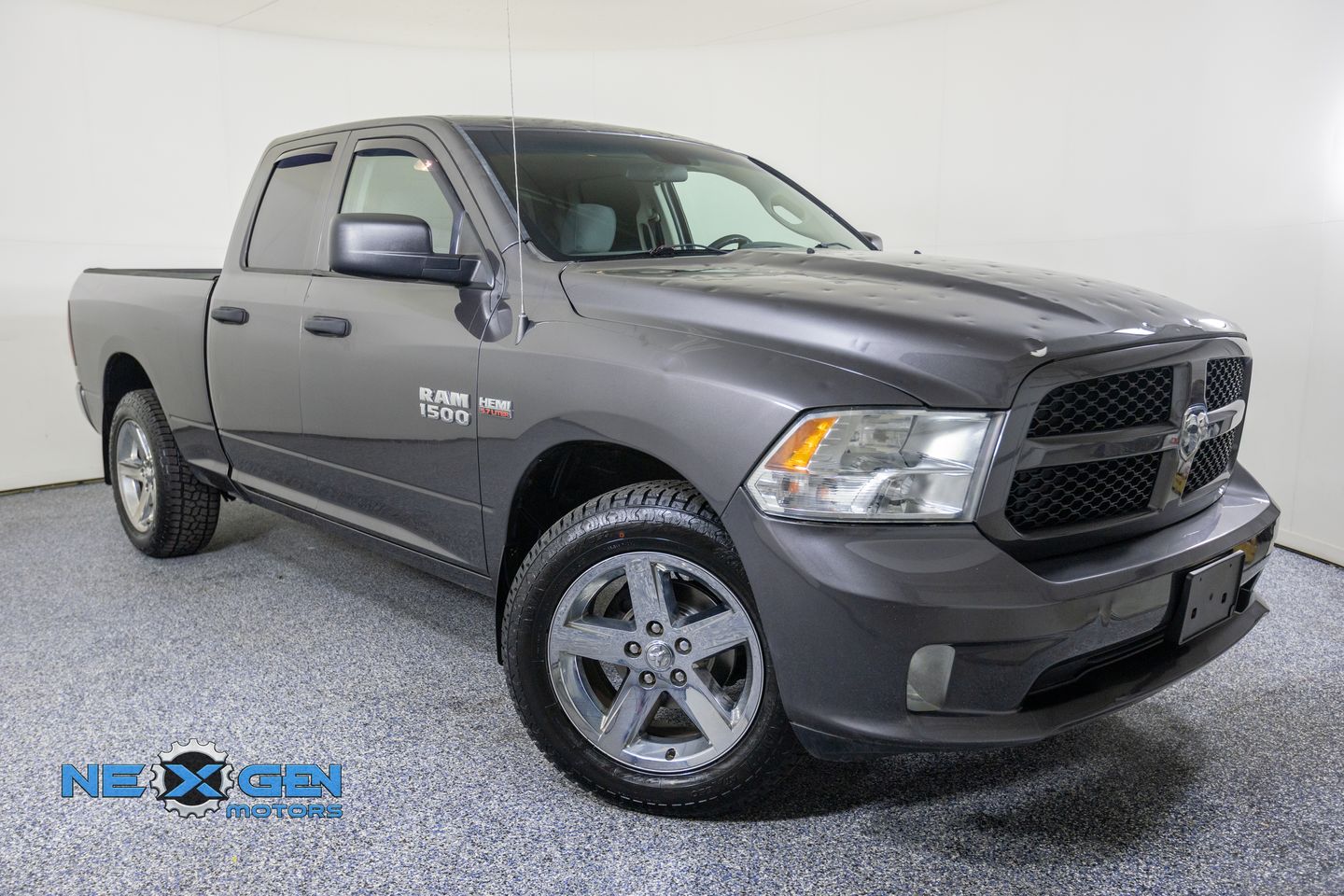 Gray (Granite Crystal Metallic Clearcoat) 2018 RAM 1500 Express Quad Cab 4WD Pickup Truck Four-Wheel Drive 8-Speed Automatic