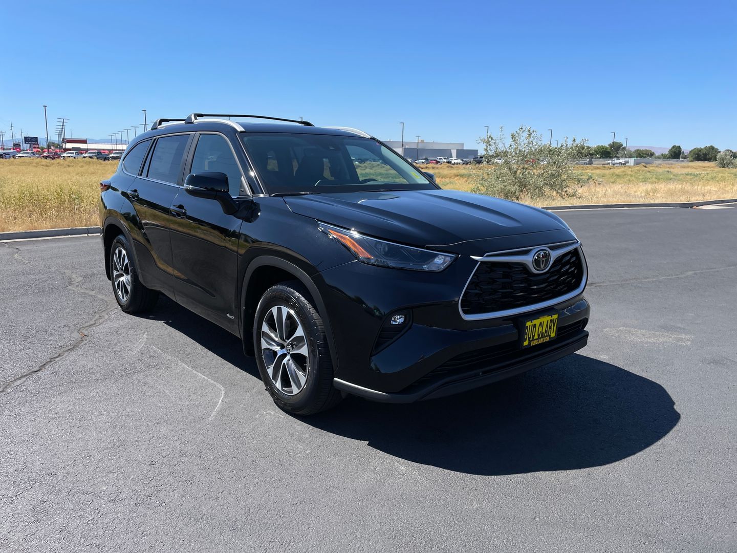 Midnight Black Metallic 2026 Toyota Highlander Hybrid SUV / Crossover All-Wheel Drive Continuously Variable Transmission