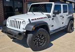 2016 Jeep Wrangler Unlimited Sport — Bright White Clearcoat exterior view 2, for sale at Velocity Auto Source in RICHMOND, KY