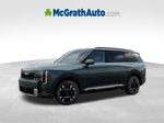 2027 Kia Telluride Hybrid EX — Black Jade Green exterior view 3, for sale at McGrath Ford in Hiawatha, IA