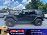 2024 Jeep Wrangler Rubicon — Black Clearcoat exterior view 5, for sale at Autostar CDJR of Hendersonville in Hendersonville, NC