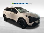 2026 Kia Sportage X-Line — White Pearl exterior view 2, for sale at McGrath Ford in Hiawatha, IA
