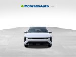 2026 Kia K4 LXS — Snow White Pearl exterior view 3, for sale at McGrath Ford in Hiawatha, IA