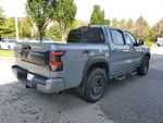 2026 Nissan Frontier PRO-4X — Boulder Gray exterior view 4, for sale at Downtown Nashville Nissan in Nashville, TN