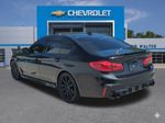 2018 BMW 5 Series M550i xDrive - Black Sapphire Metallic exterior view 4
