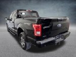 2016 Ford F-150 XLT — Shadow Black exterior view 4, for sale at Lincoln of Bloomington in Bloomington, MN