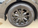 2024 Kia Carnival SX — Aurora Black interior and detail view 15, for sale at Velocity Auto Source in RICHMOND, KY