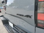 2024 Nissan Frontier PRO-4X — Boulder Gray exterior view 6, for sale at Downtown Nashville Nissan in Nashville, TN
