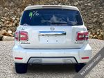 2017 Nissan Armada Platinum — Pearl White exterior view 4, for sale at A Better Way Wholesale Autos in Naugatuck, CT