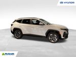 2026 Hyundai Tucson Hybrid SEL — White Pearl primary exterior view, for sale at McGrath Ford in Hiawatha, IA
