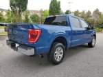 2023 Ford F-150 XLT — Blue Metallic exterior view 4, for sale at Downtown Nashville Nissan in Nashville, TN